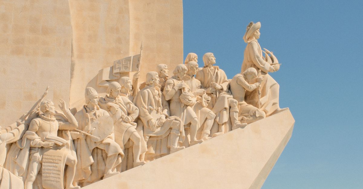 Explore the historic Padrao dos Descobrimentos monument in Lisbon, Portugal, under a clear blue sky.